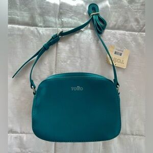 Totto Heal Cross-body Bag in a teal or turquoise color